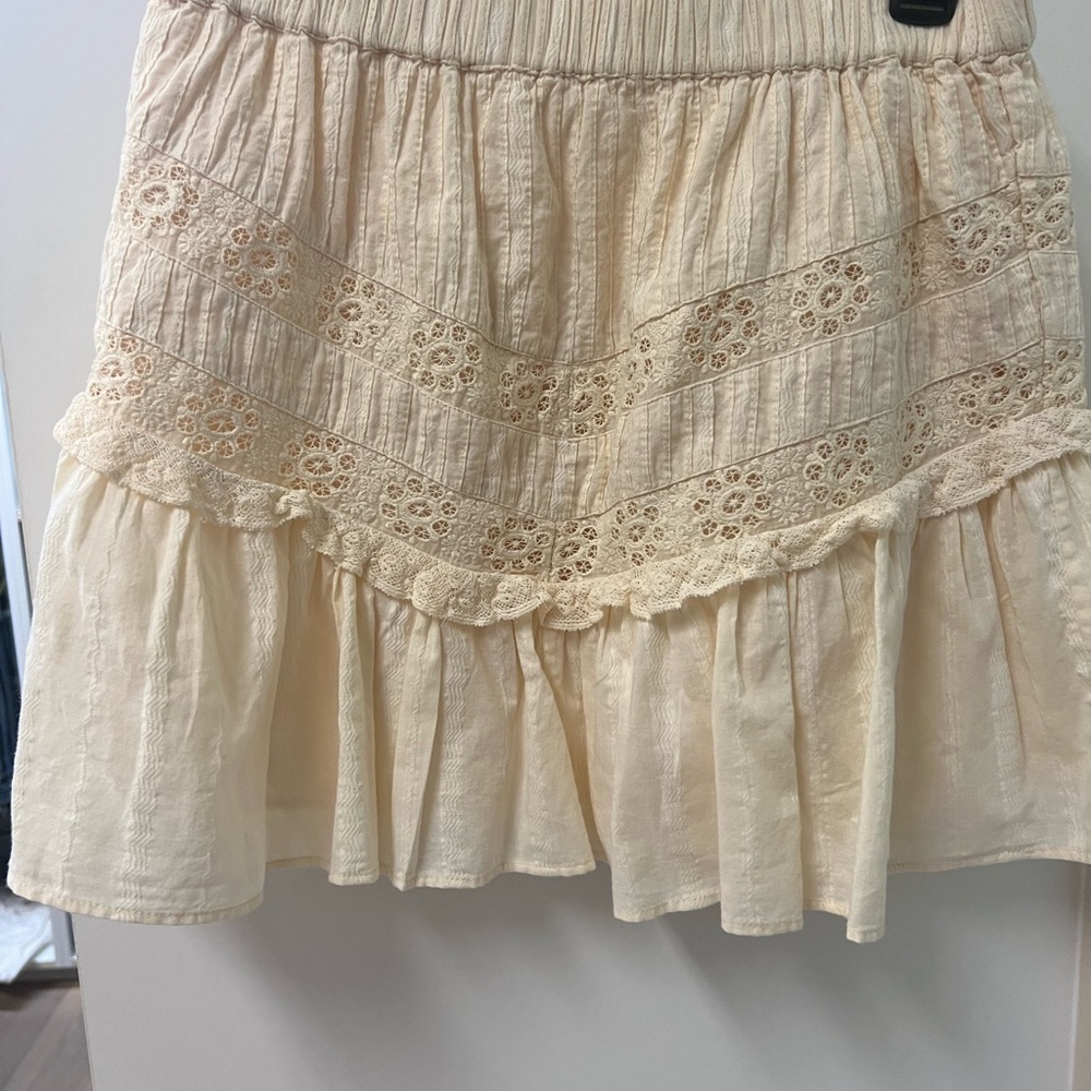 Cream-colored eyelet skirt